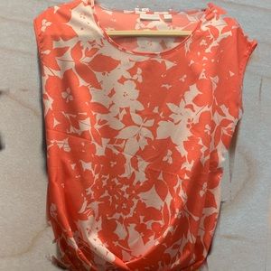 Cute orange New York and company top with a flowered print xs